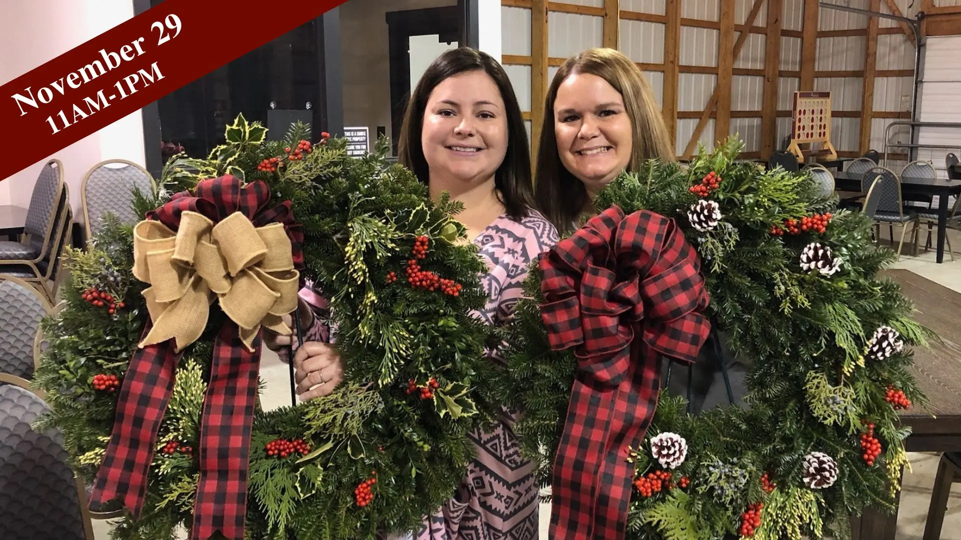 Picture of two women holding Christmas wreaths